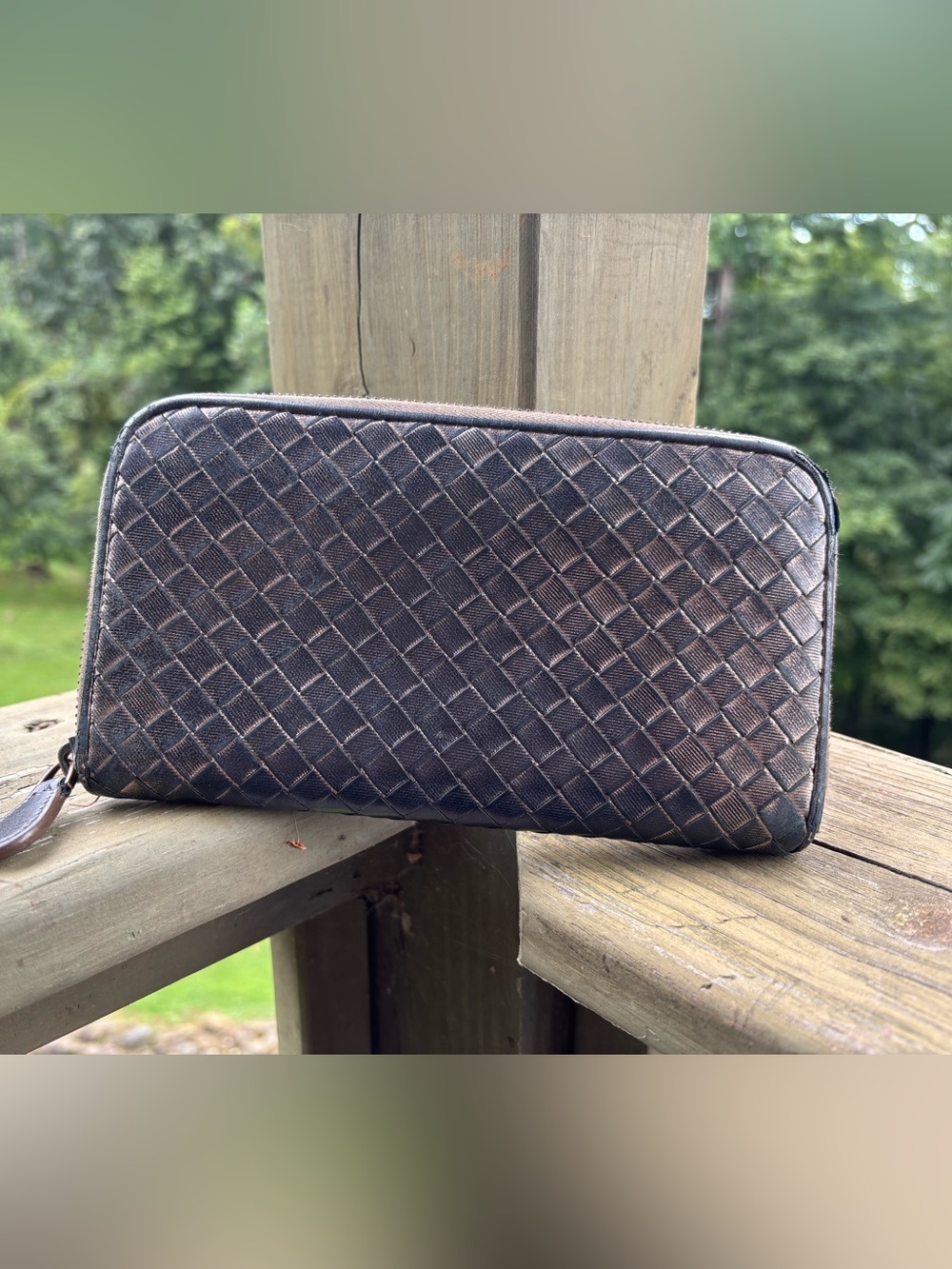 Bottega Veneta Intrecciato long Zip wallet with dark metallic brown finish